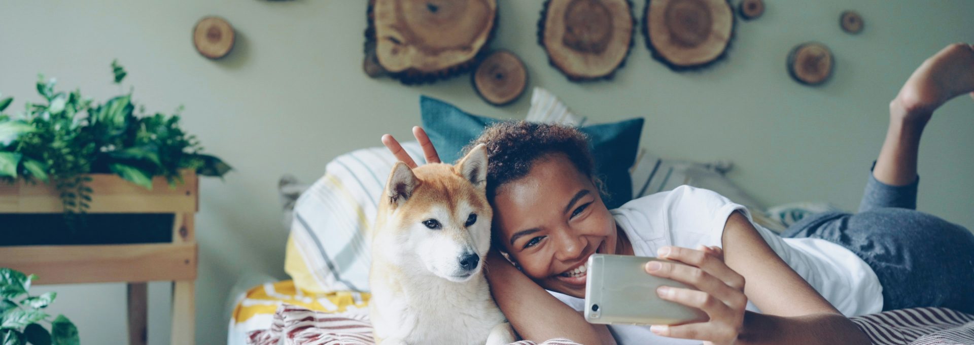 A woman takes a selfie with her dog
